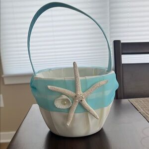 Beachy flower girl basket with blue petals, used one day only